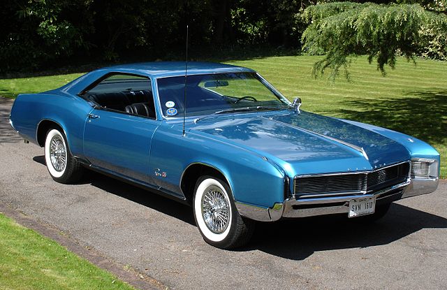 1966 buick riviera blue side view